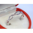 Jednoduchý dámsky strieborný prsteň prepletaná obruč ródium VPS56155 925/1000 1,55 g
